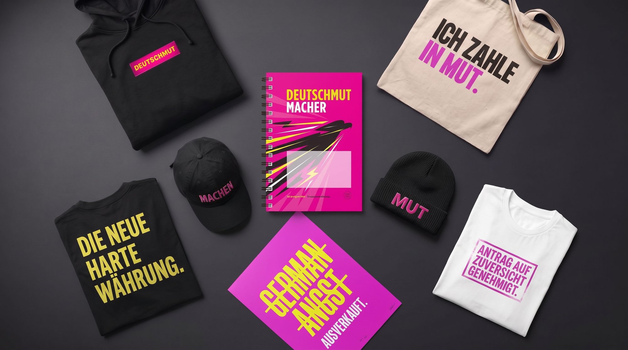 Drop 001 komplett: Hoodie, Cap, Beanie, zwei T-Shirts, Tote, Print und die Collector’s Edition des Buchs auf dunklem Grund